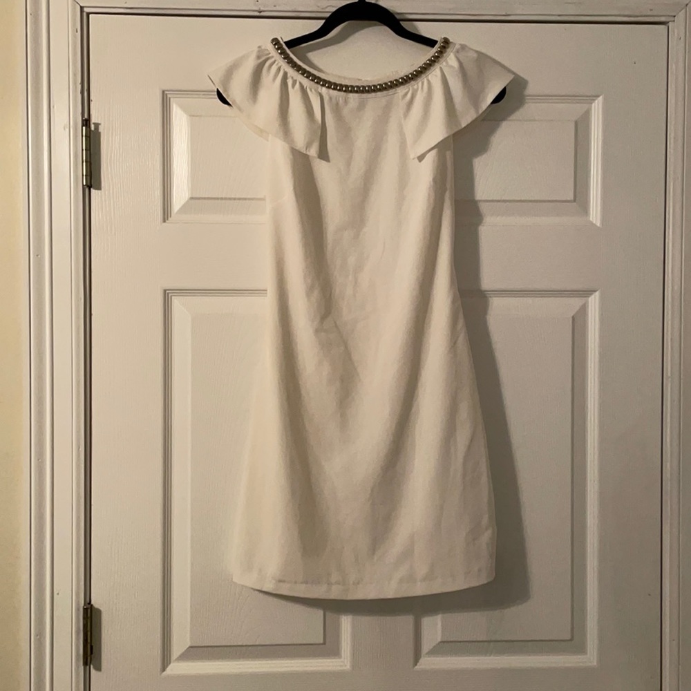 White dress with silver embellishments